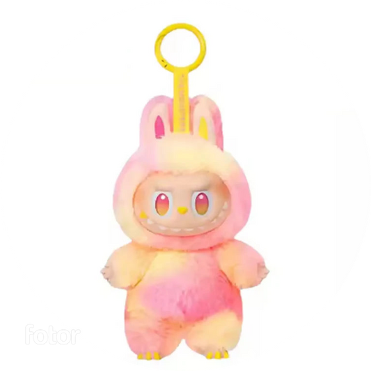 Plush Labubu toy with a gradient color pattern on a white background